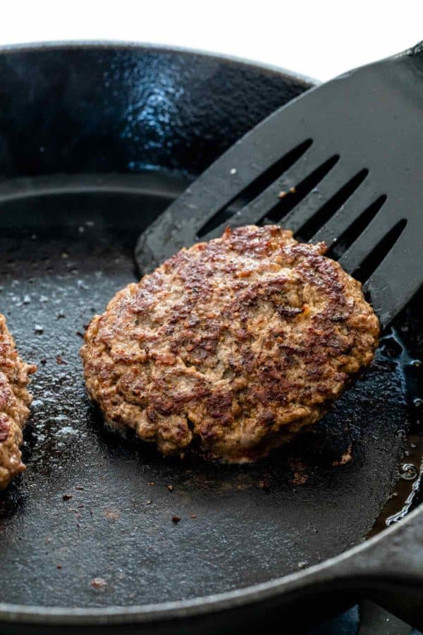 burger cooking on a pan